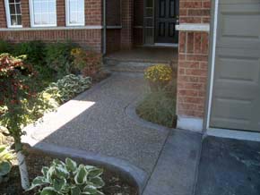 Exposed aggregate sidewalk and steps with concrete border Hamilton ON